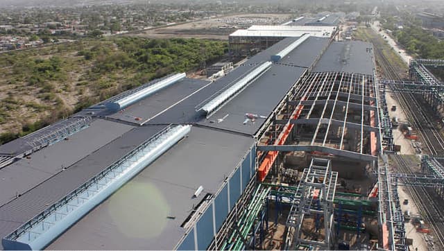 Vista isométrica de una industria con ventiladores magnavalve